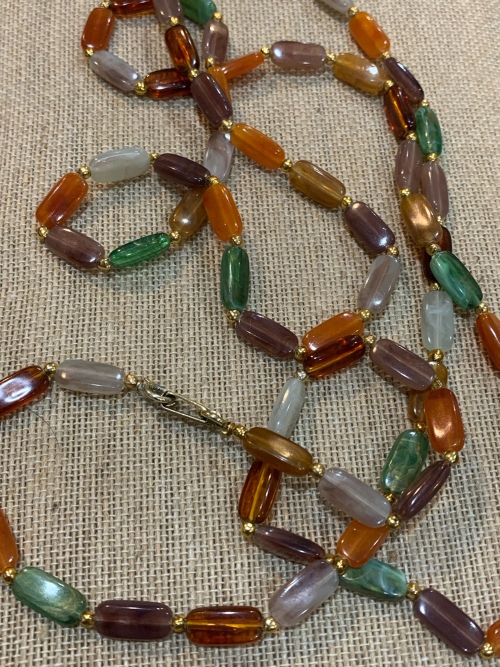 Vintage signed Hong Kong opera length necklace.  Multicolor